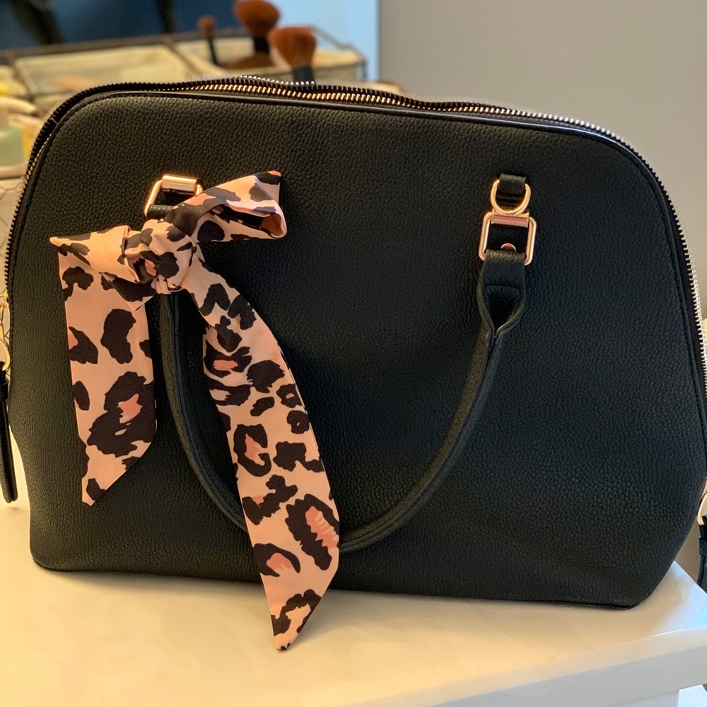 Seven Days black leather pocketbook
